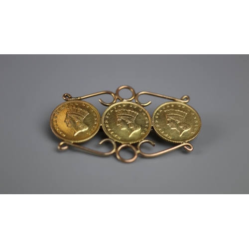 69 - Gold brooch set with 18ct gold dollars - together with a gold stick pin set with 18ct gold dollar da... 