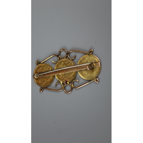 69 - Gold brooch set with 18ct gold dollars - together with a gold stick pin set with 18ct gold dollar da... 