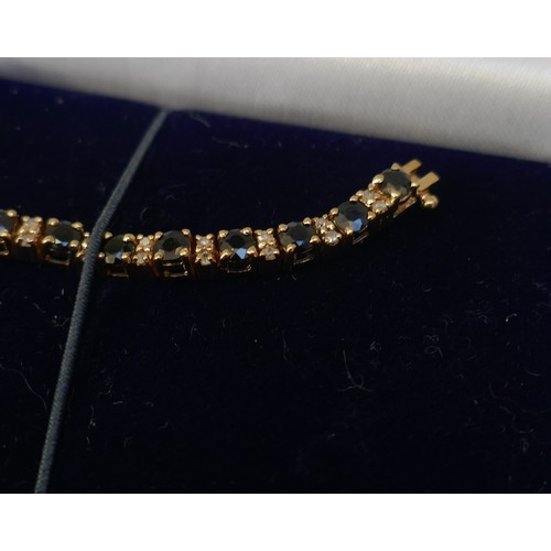 19 - Gold sapphire & diamond tennis bracelet