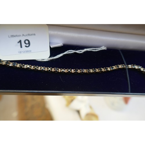 19 - Gold sapphire & diamond tennis bracelet