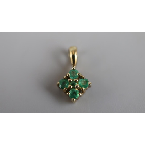 13 - 9ct gold emerald set pendent