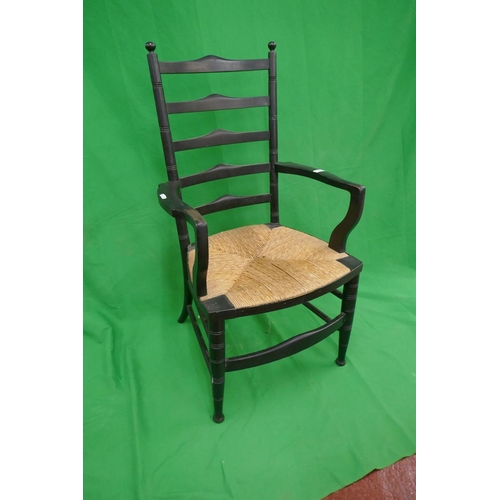 388 - Arts & crafts ebonised armchair