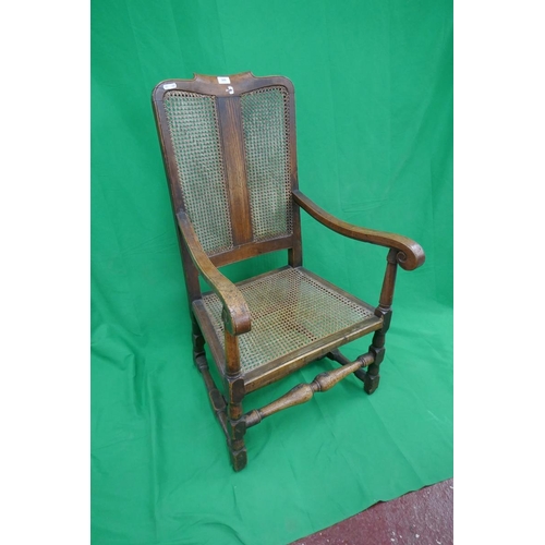 389 - Walnut and bergere antique armchair
