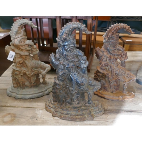 396 - 3 cast iron Mr Punch door stops