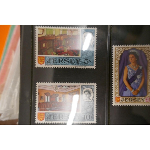121 - Stamps - Channel Islands and Isle of Mann presentation packs and FDC plus 5 FDC albums (empty)