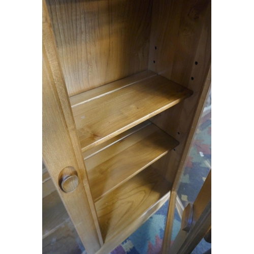 348 - Blonde elm Ercol glazed bookcase - Approx size: W: 92cm D: 29cm H: 98cm