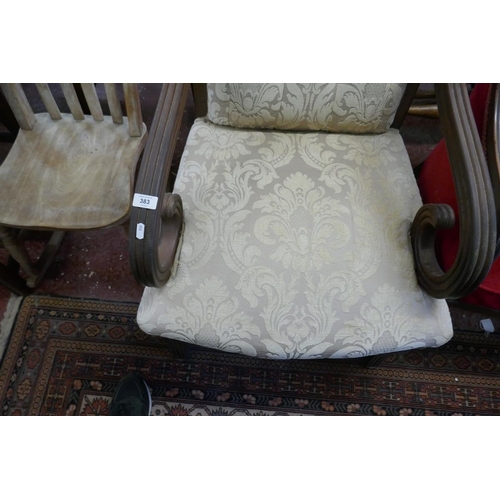 383 - Antique scroll arm armchair