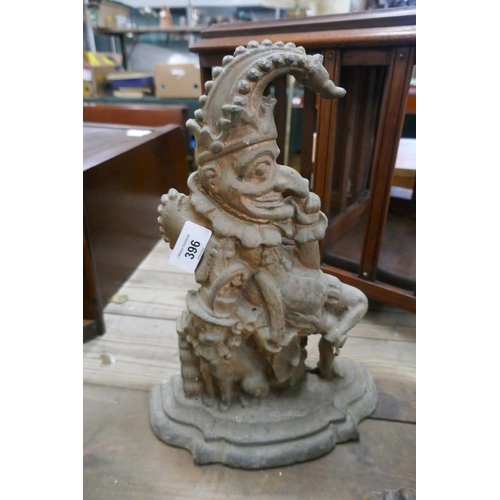 396 - 3 cast iron Mr Punch door stops