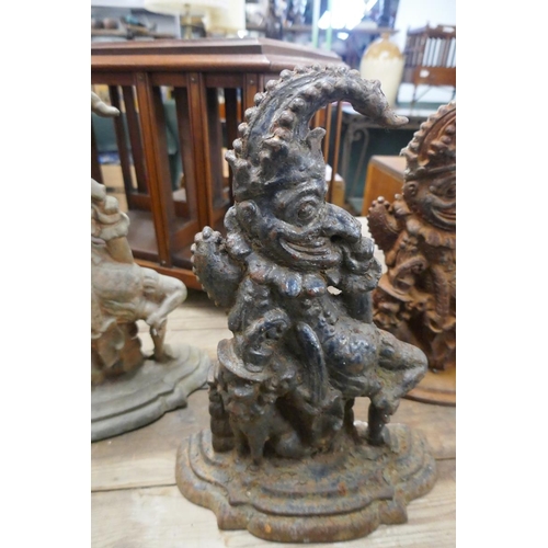 396 - 3 cast iron Mr Punch door stops