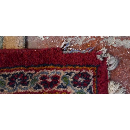 351 - Large red patterned wool rug - Approx size: 290cm x 188cm