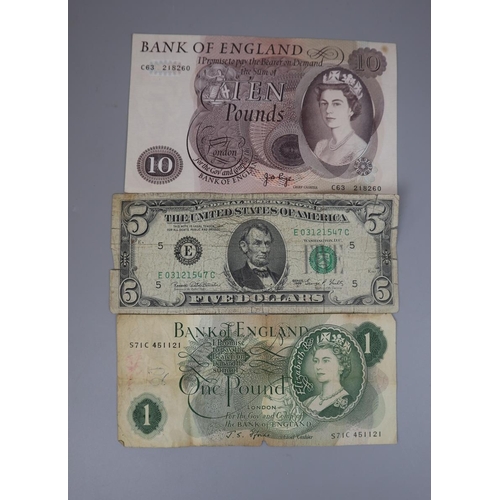 100 - Bank of England £10 note together with a £1 note and a $5 note