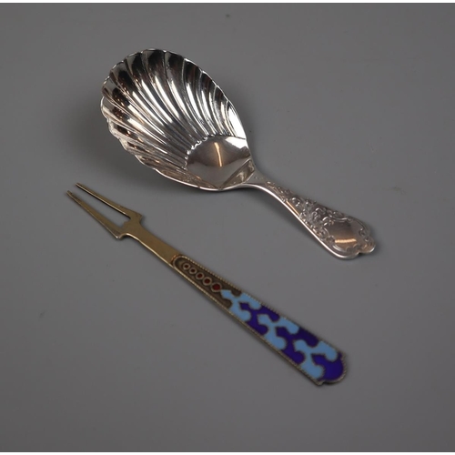 2 - Victorian silver spoon together with a silver lemon fork