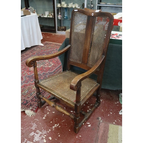 256 - Walnut and bergere antique armchair