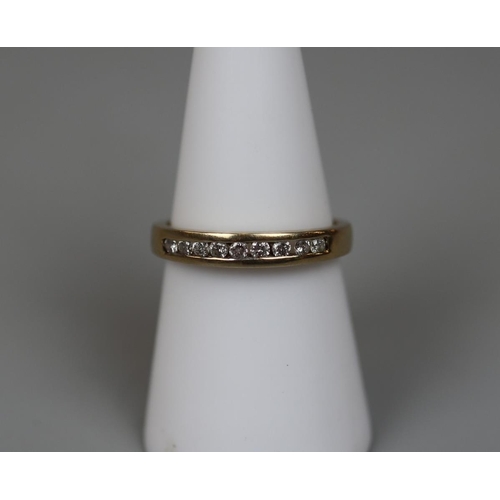 36 - 9ct gold channel set diamond ring - Size N½