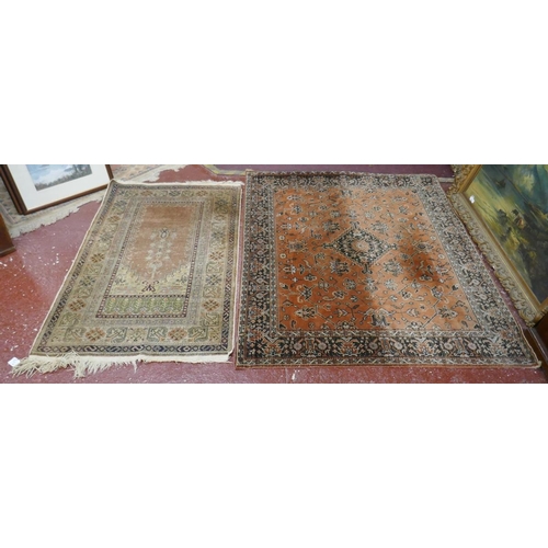 422 - 2 patterned rugs