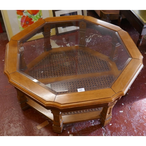 449 - Octagonal glass and bergere coffee table