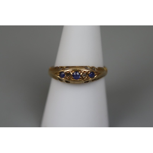 54 - 18ct diamond and sapphire 5 stone ring - Size O½