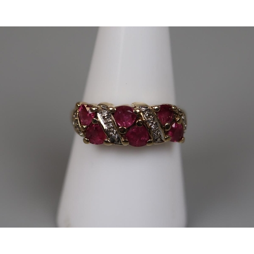 72 - 9ct gold ruby and diamond ring - Size P