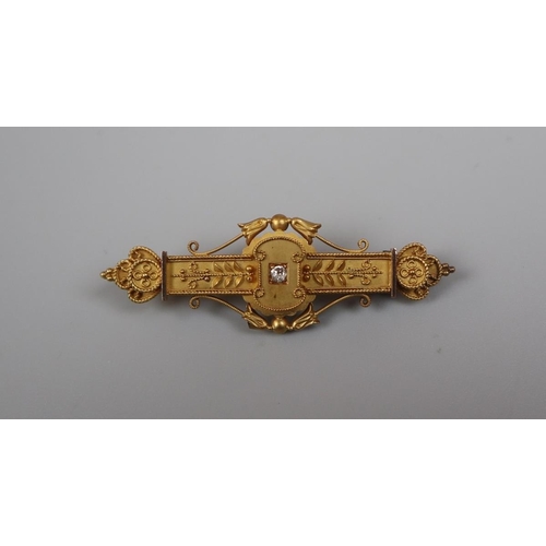 80 - 16ct gold diamond set bar brooch