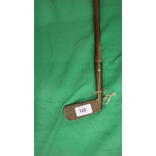 125 - Hickory shafted brass putter with pyramid mark