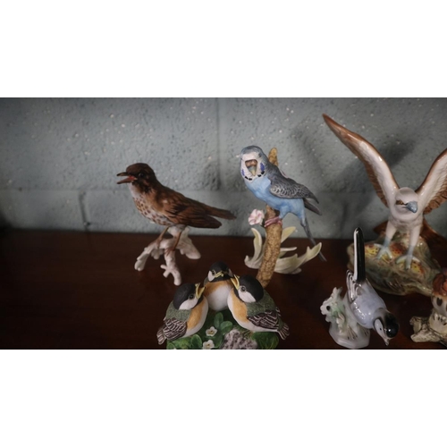 225 - Collection of ceramic birds and paperweights to include Goebel etc