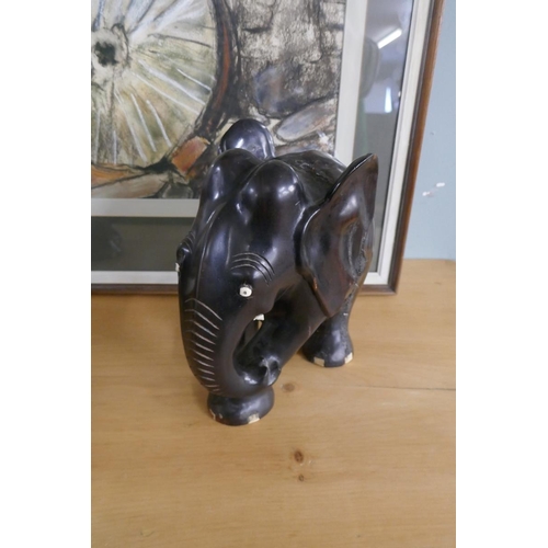 361 - 2 ebony carved tribal elephants - Approx height: 23cm