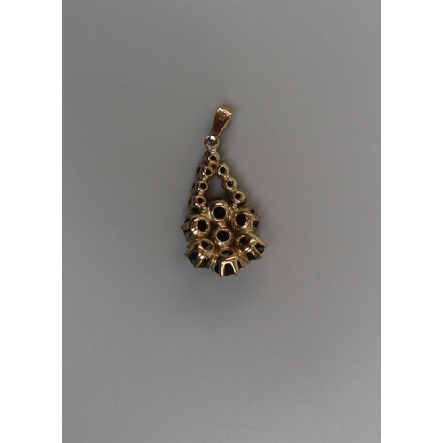 58 - 8ct gold garnet set pendant
