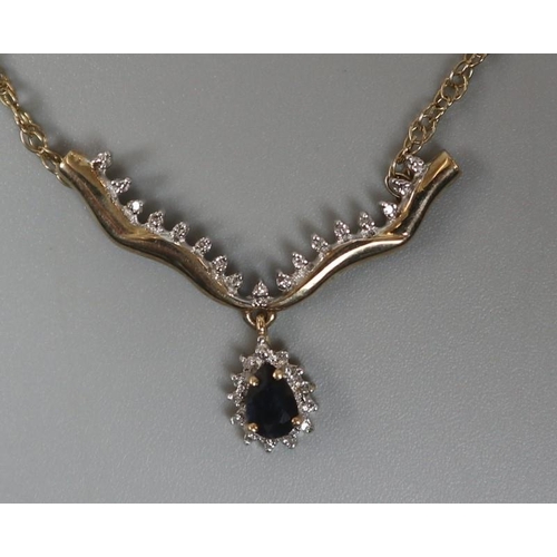 63 - 9ct gold diamond and sapphire necklace