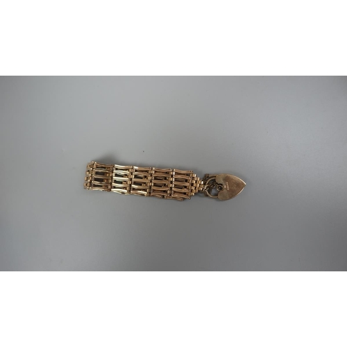 77 - 9ct gold gate bracelet - Approx weight 24g