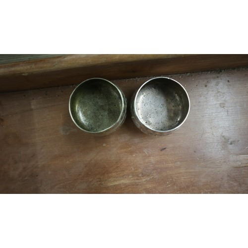 275 - Collection of metal ware to include toddy ladels, ink wells and a pair of white metal salts