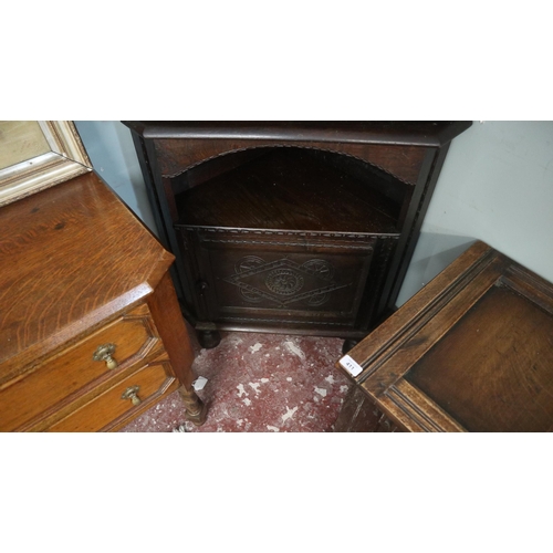 410 - Antique oak carved corner cupboard