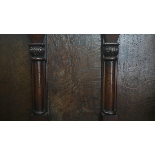 367 - Early carved oak settle – L: 112cm H: 122cm D: 47cm