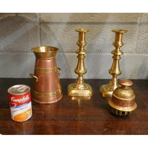 183 - Collection of brass to include elephant claw bell, candlesticks and churn