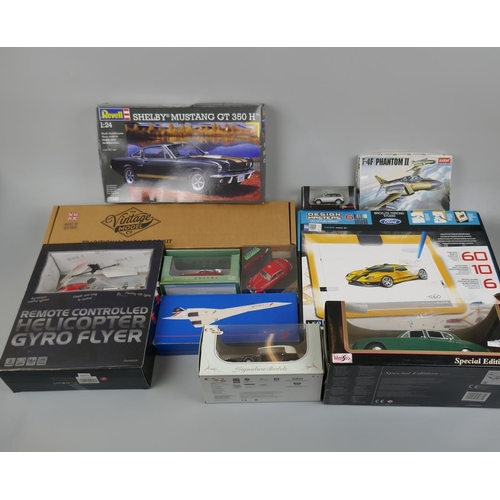 219 - Collection of models to include remote controlled helicopter, die cast cars, model kits etc.