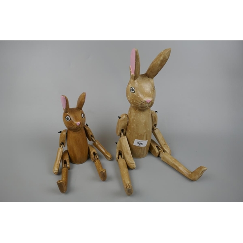 505 - 2 graduated articulated rabbits