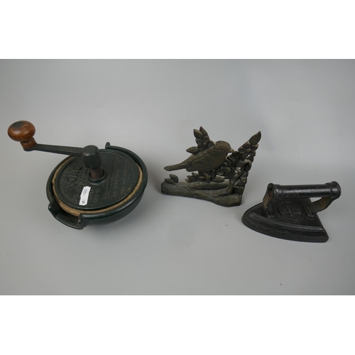 508 - Cast iron knife sharpener, doorstop and flat iron