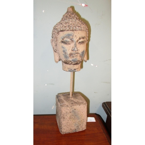 509 - Stone Buddha head on plinth