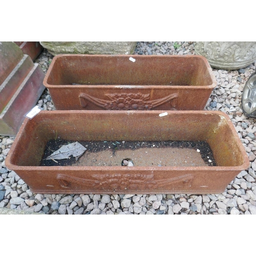 532 - Pair of cast iron trough planters