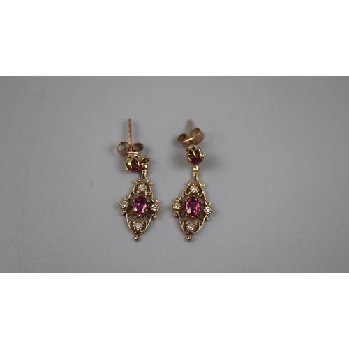 68 - Pair of ruby and diamond gold set earrings