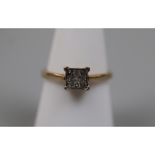 74 - 9ct gold ring set with 9 princess cut diamonds - Size: P