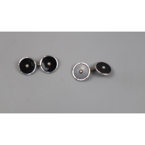 77 - Pair of 9ct white gold onyx and pearl cufflinks