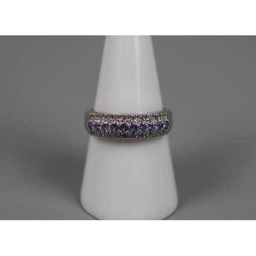 78 - 9ct white gold tanzanite and diamond set ring - Size: P