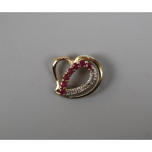 82 - Gold ruby and diamond set pendant