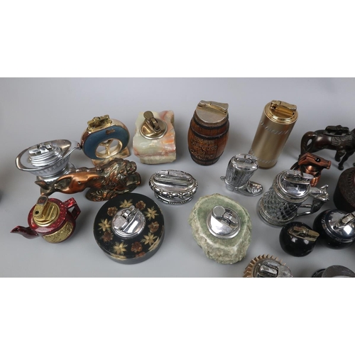 139 - Collection of vintage table top lighters