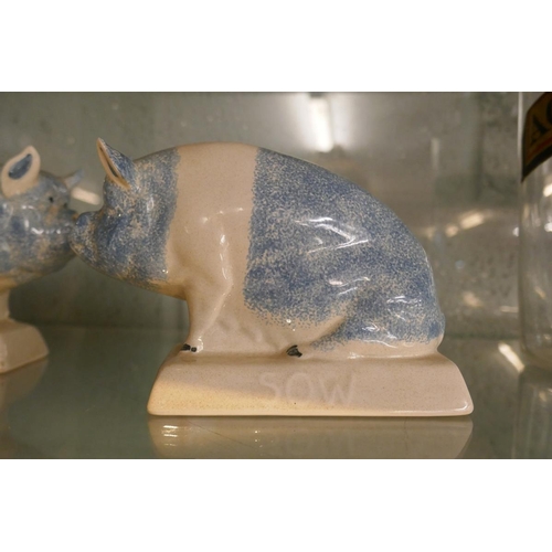 193 - Pair of Rye pottery pigs