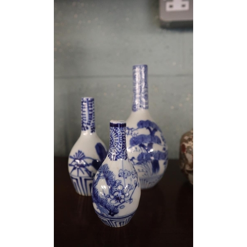 234 - Collection of small Oriental bud vases