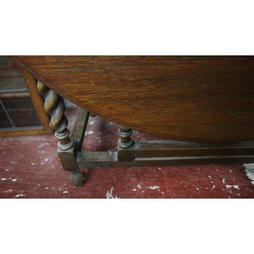 338 - Oak gateleg table with barley-twist legs