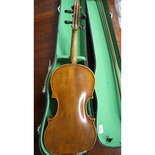 348 - Adult full size violin - label inside together with a French bow