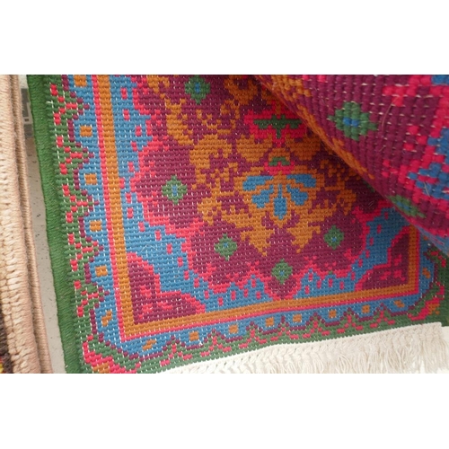 457 - 4 patterned rugs