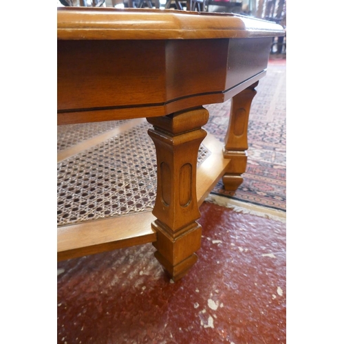 487 - Octagonal glass and bergere coffee table